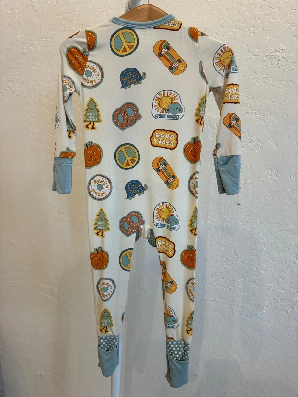 Angel Dear Cream One-Piece Footie Pajamas with Blue Trim and Yellow Accents